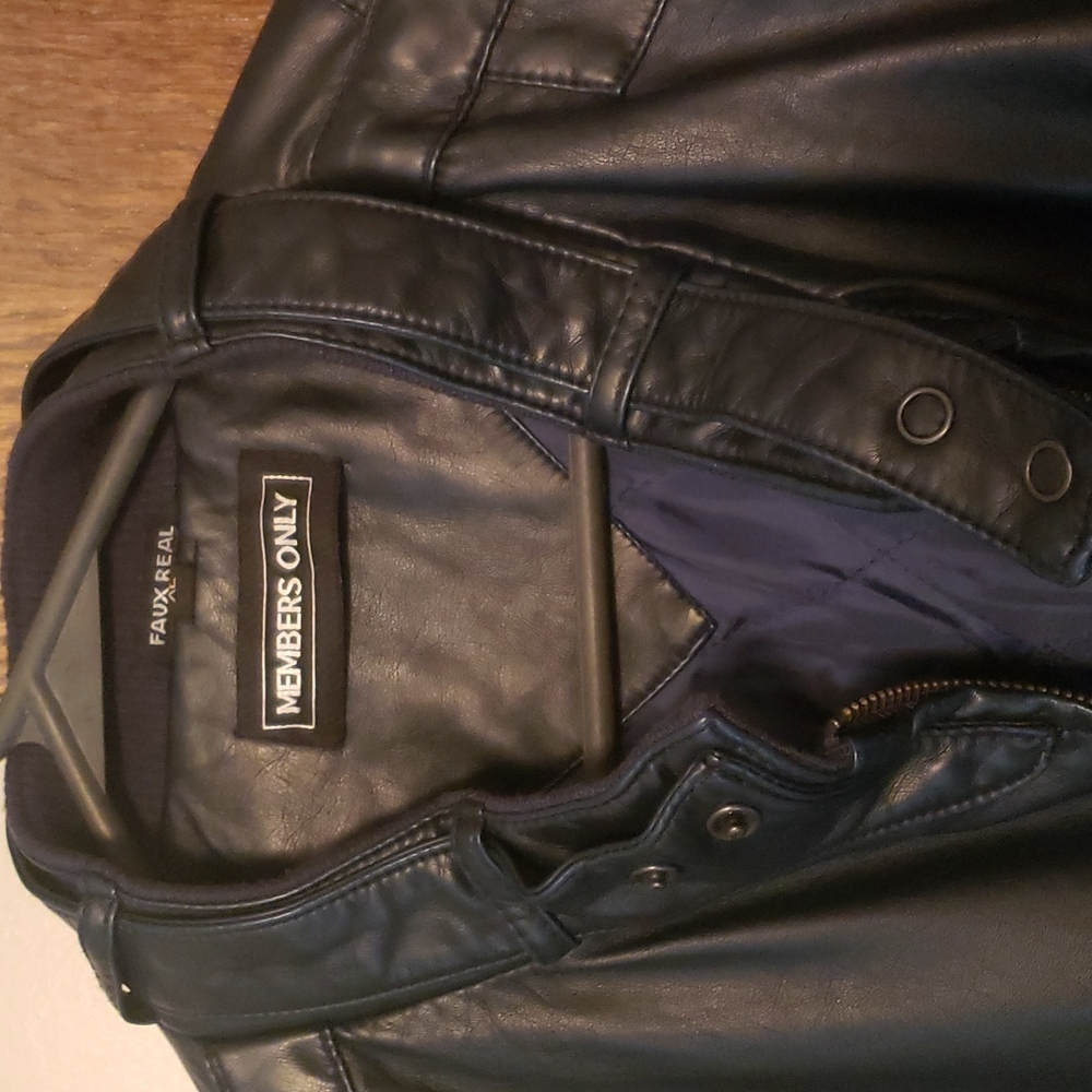 XL members only jacket. Dark blue.